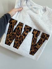 Load image into Gallery viewer, Leopard State Abbreviation Shirt